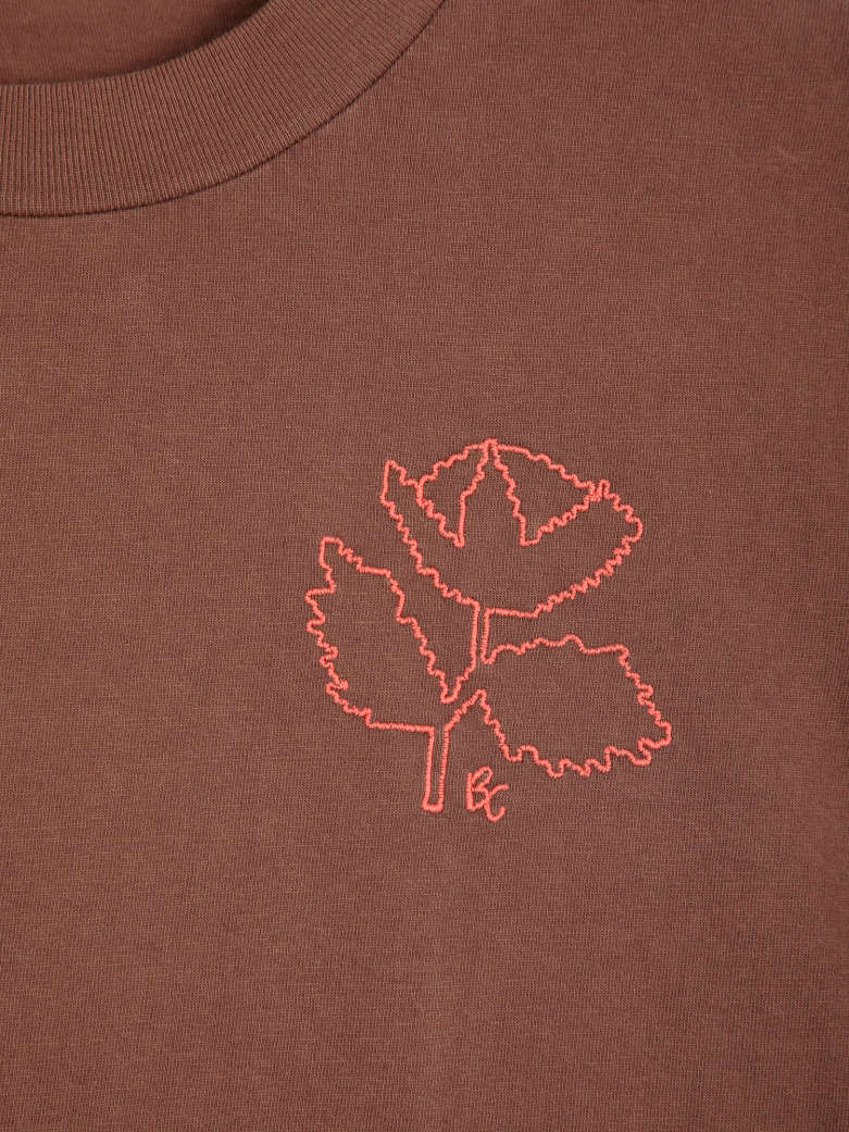 Red vibrant flower shirt